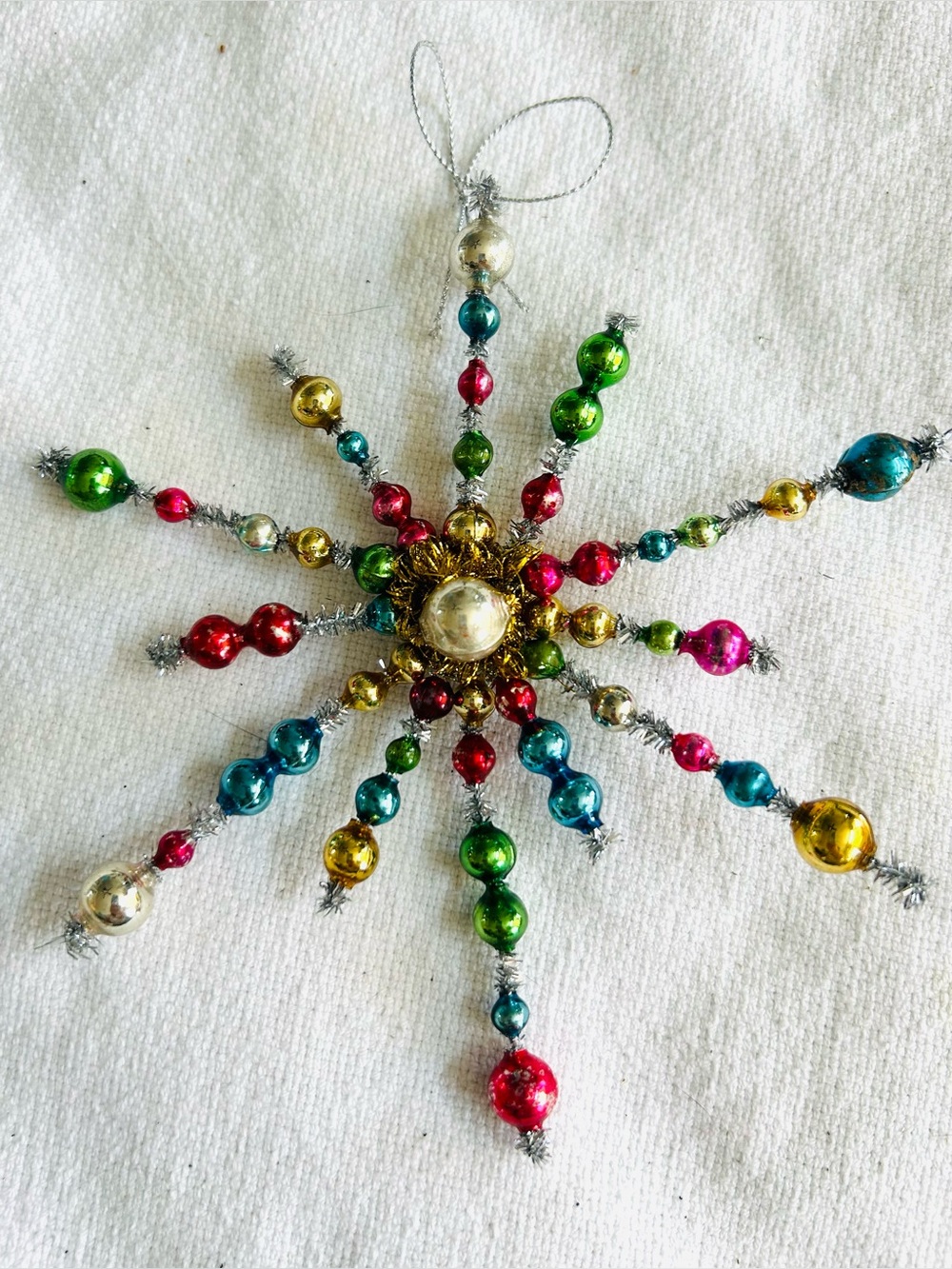 Vintage repurposed holiday star burst Christmas Ornament